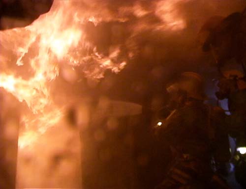 Create burning scene rescue photos and watch footage of E-51 rolling on a rescue from the captain's seat.