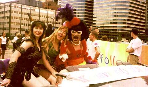 With the American Xena in a car as Gabrielle in a Minneapolis Parade.