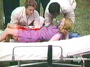 Image of emtambulanceattendantsloadwomanono2.jpg