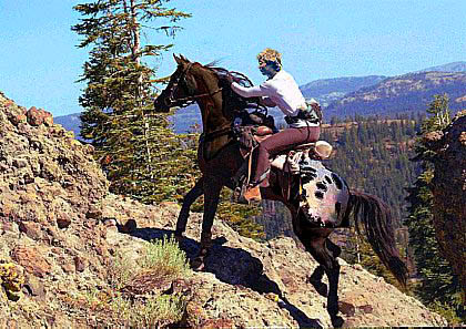 Image of johndenverupmountainonhorsesmall.jpg