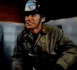 Image of capgrimacedarkstanding.jpg