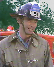 Image of capsmilewithwomancrop.jpg