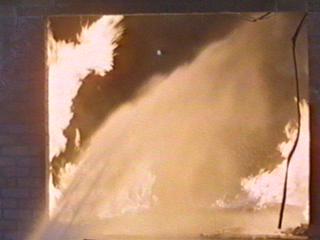 Image of firehosewaterthroughwindownight.jpg