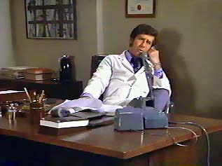 Image of brackettonphoneinoffice.jpg