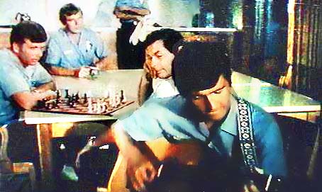 Image of stokermarcolistentogageguitarchess.jpg