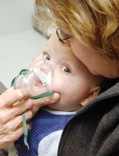 Image of momholdoxygenmasktobaby.jpg