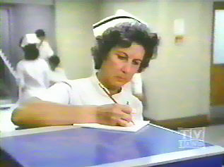 Image of nursebettytakesnotescloseup.jpg
