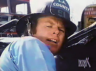 Image of roylookbackhelmetclose.jpg